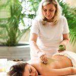 Therapist providing Ayurvedic Massage and Panchakarma treatment